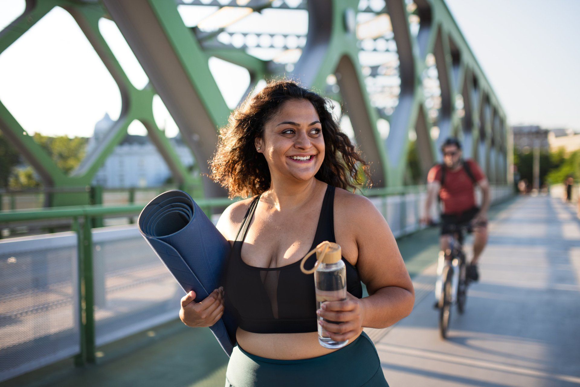 Women Carrying Mat And Water Bottle — Lady Lake, FL  — RN Medical Laser & Weight Loss