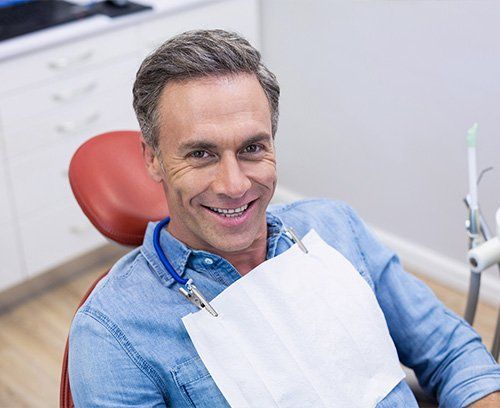 Middle Aged man waiting sitting in the Dental Chair at Union Dental