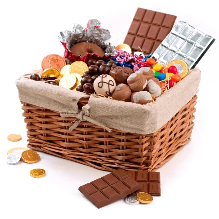 A wicker basket filled with chocolates and coins