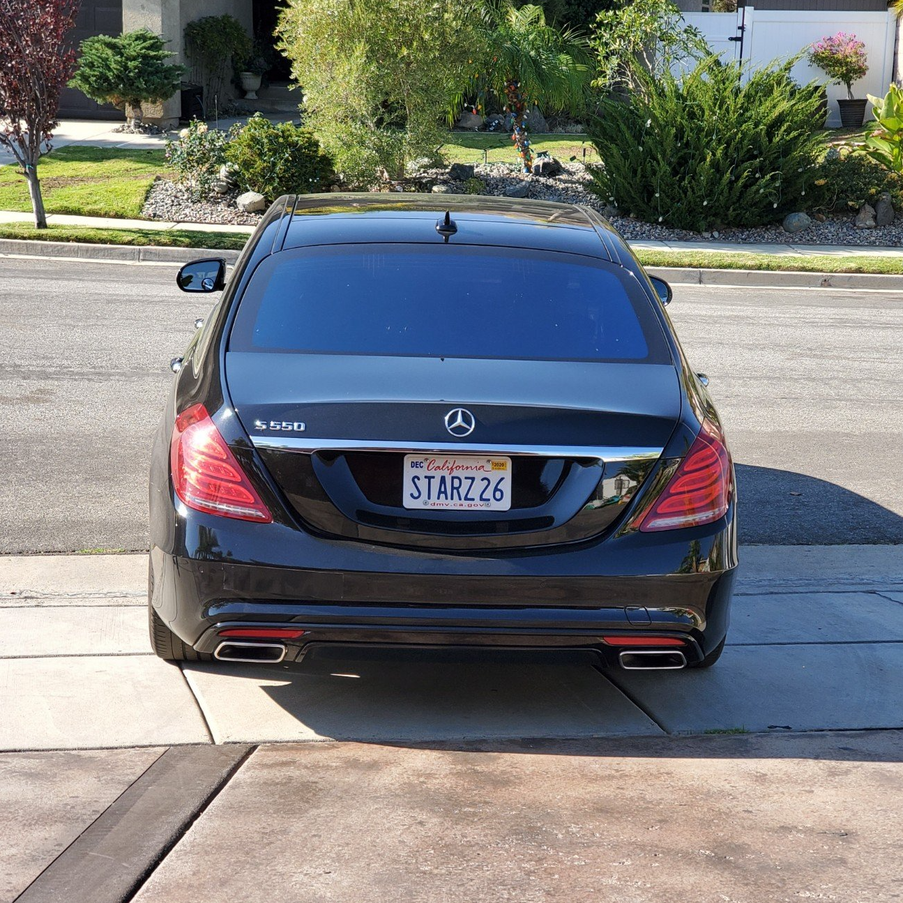 A black car with a license plate that says star226