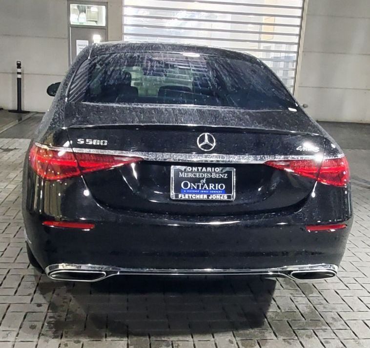 A black car with a license plate that says star226