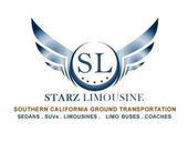 The logo for starz limousine has wings on it