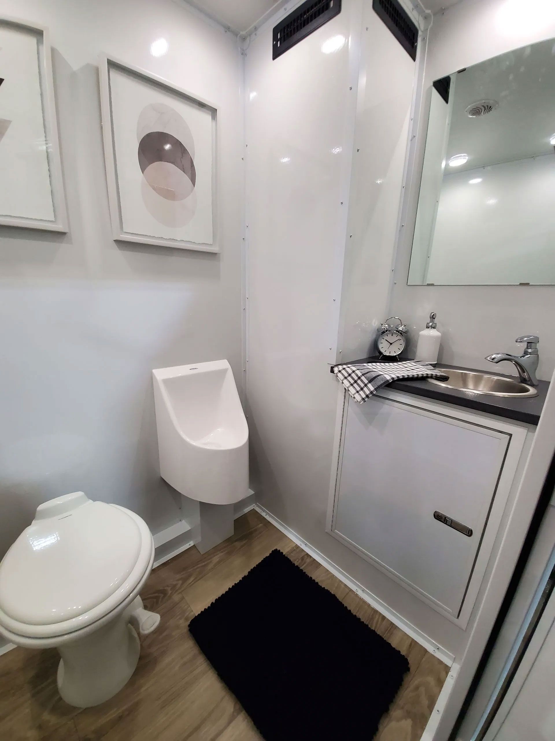 Interior of an ADA compliant luxury portable toilet. Interior of an ADA compliant luxury portable toilet.