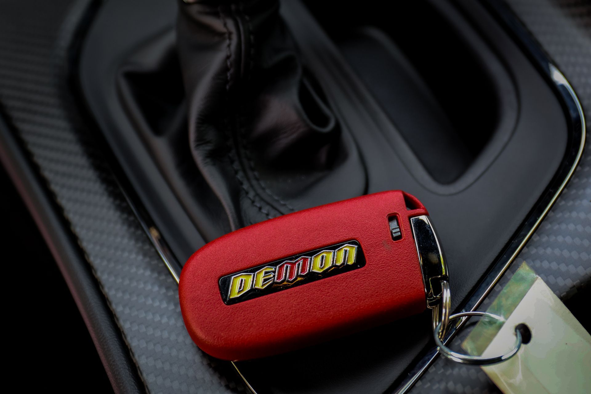 the interior of a white car with black seats and a steering wheel