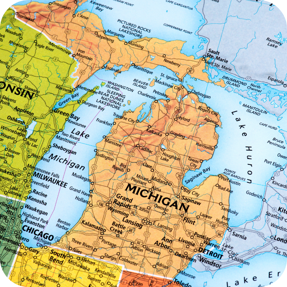 Map showing the 989 area code region in Michigan with cities like Saginaw, Bay City, and Midland.