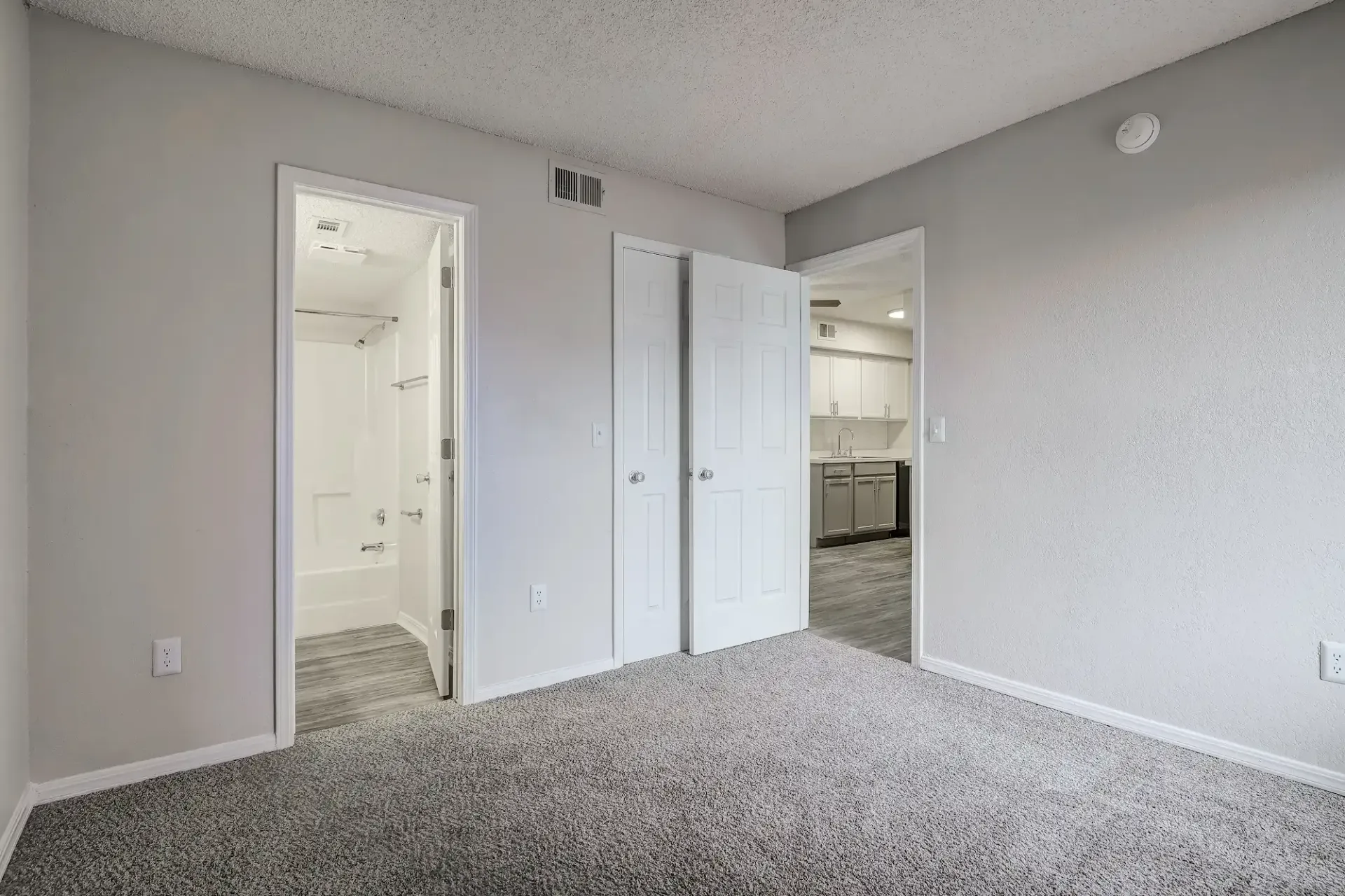 There is a ceiling fan in the room.