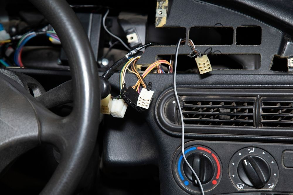 Car Dashboard Interior With Exposed Wiring — Pete's Auto Electrical in Cranbourne, VIC