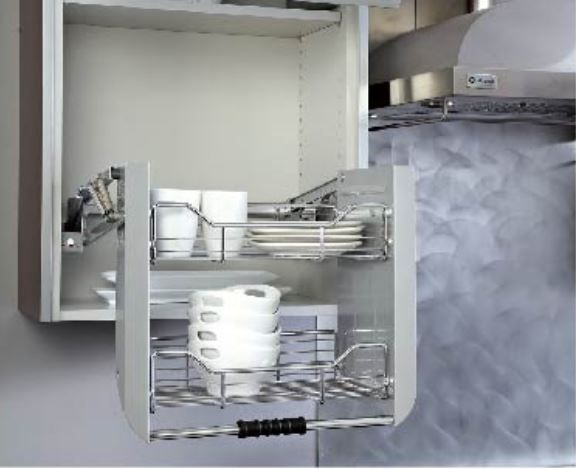 Pull-out kitchen cabinet with dish rack, loaded with white dishes. Gray cabinet, silver metal rack.