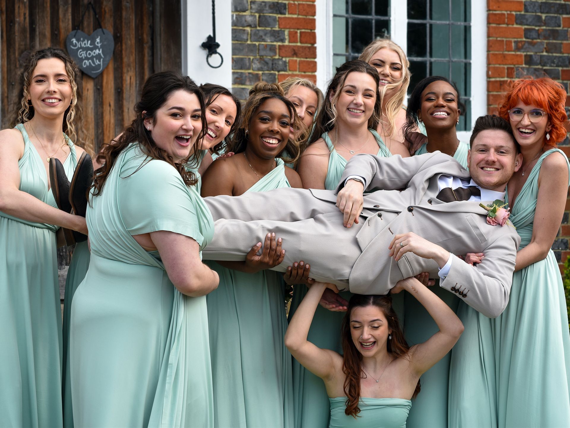 Groom and bridesmaids group photography in Dorset.