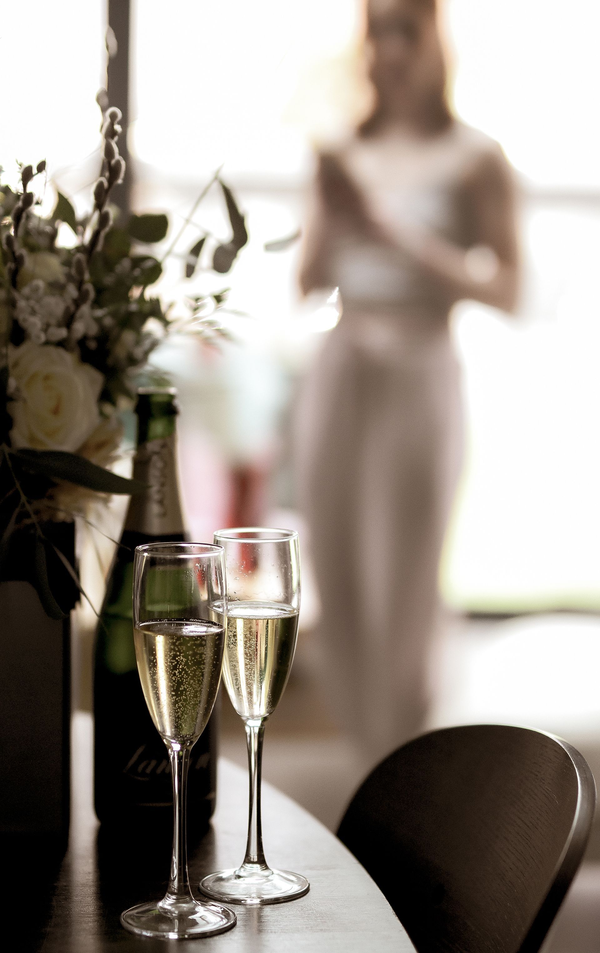 Photography of wedding champagne glasses at bride's home in Bournemouth.