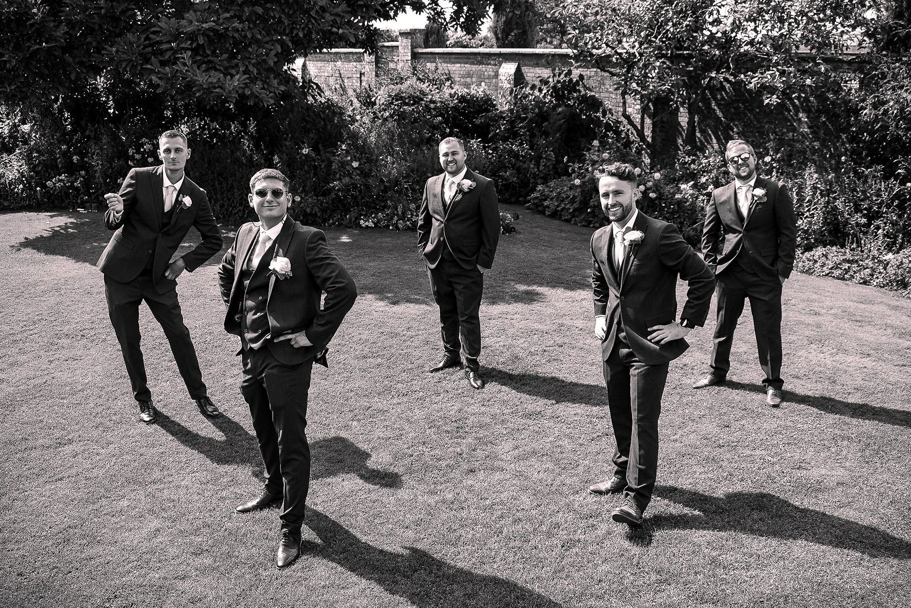The groom and his groomsmen posing for photography after the wedding at Parly Manor, West Parley.