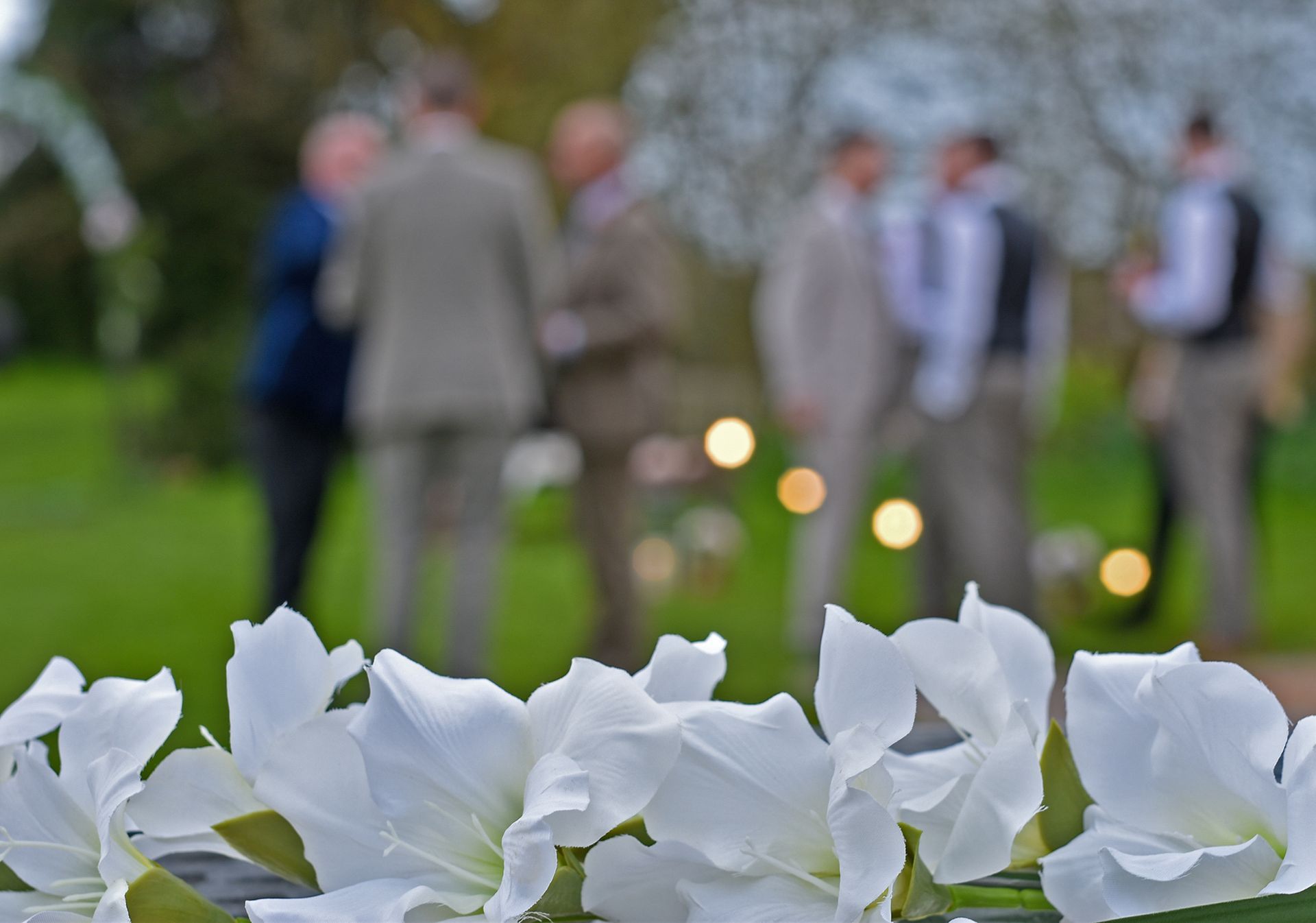 Flowers and wedding guests relaxed photography in Dorset.