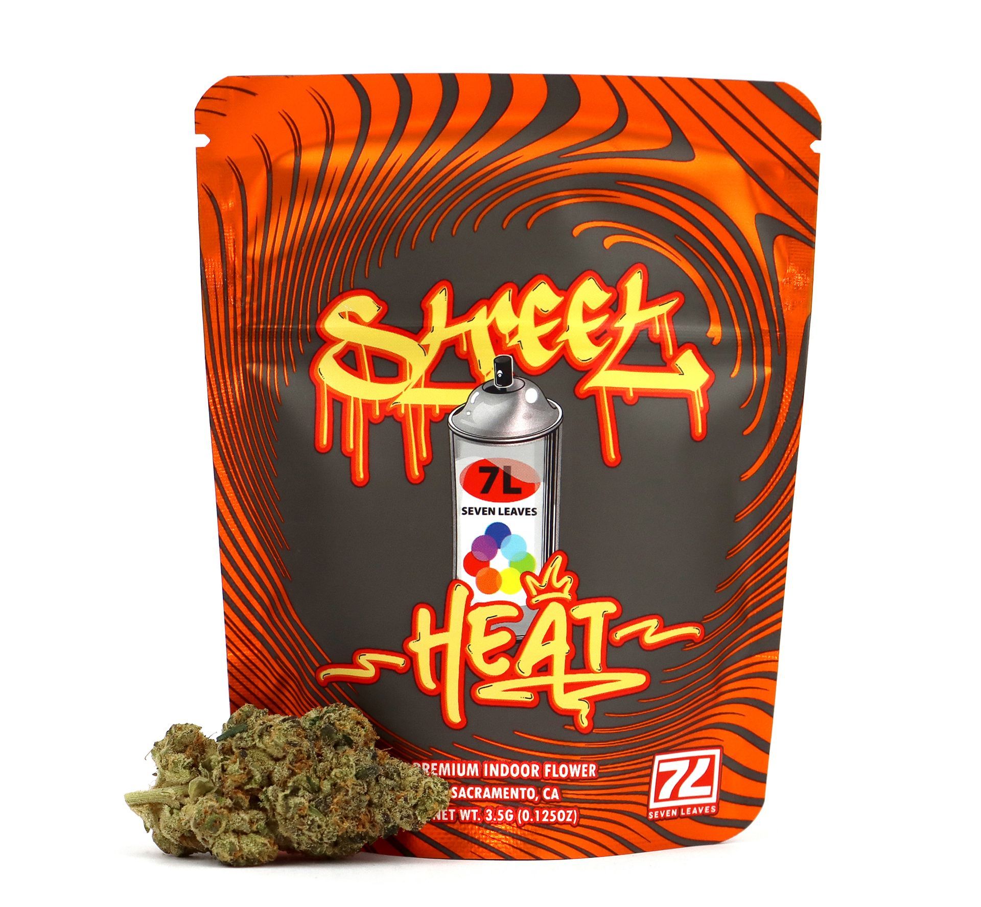 packaging spread of street heat with weed next to it