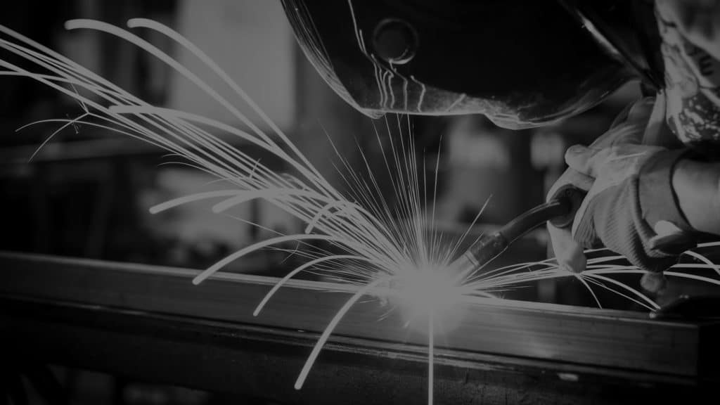 Skilled Welder Welding A Steel — Sheet Metal Fabrication in Gold Coast, QLD