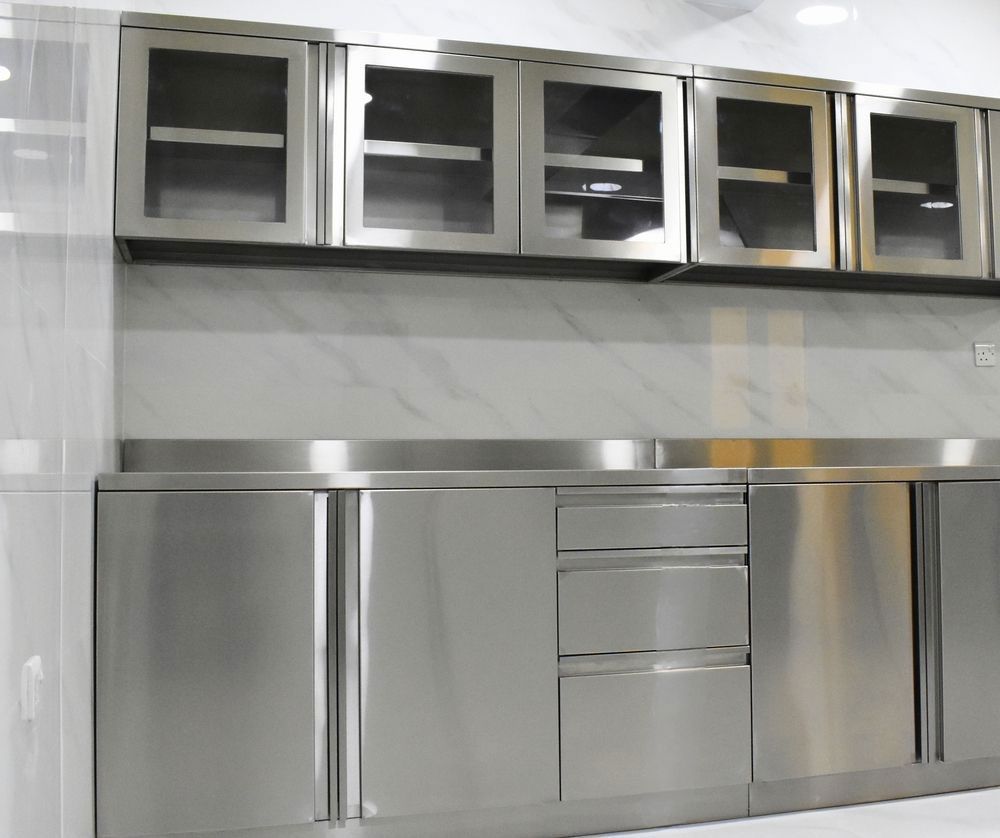 Kitchen With Custom Stainless Cabinet And Drawers