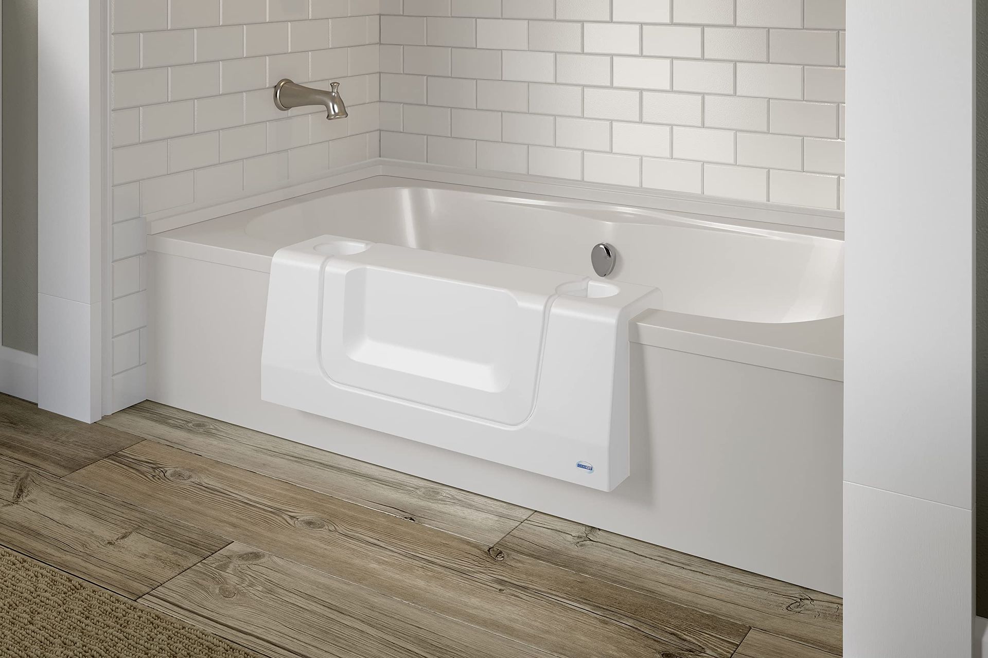 A white bathtub with a walk in door in a bathroom.