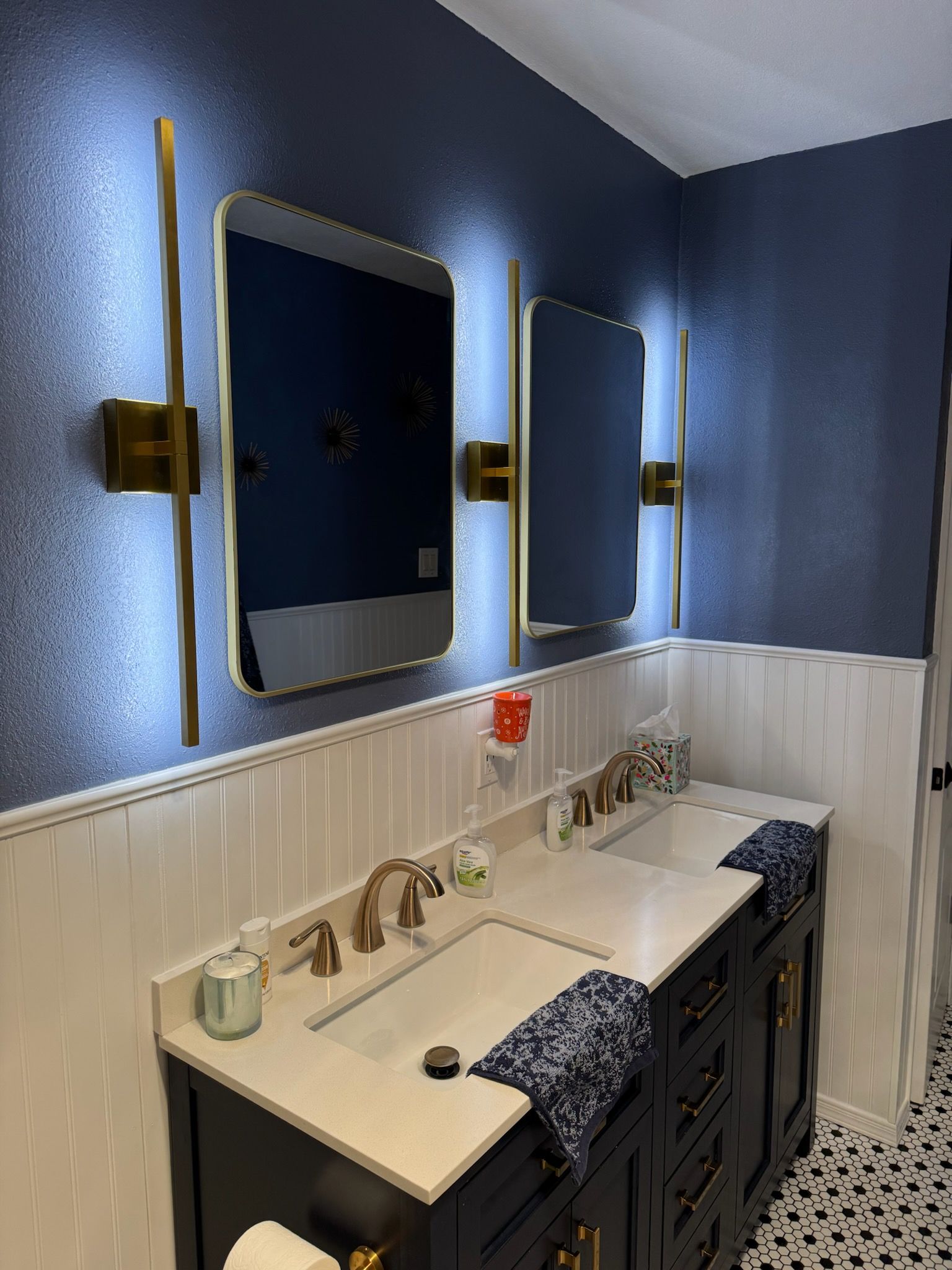 A bathroom with a toilet , sink , and shower.