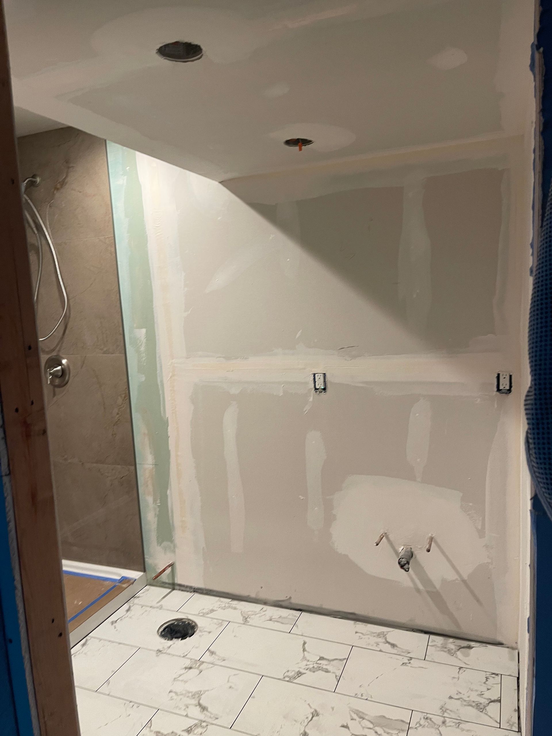 Bathroom under construction with tile floors and a shower — San Jose, CA — DB Remodeling