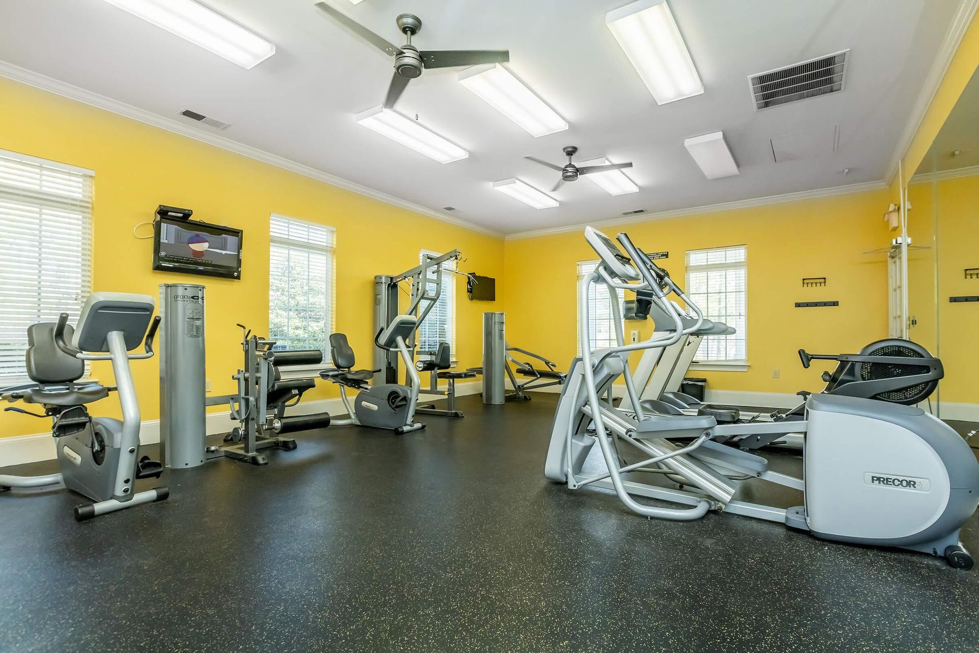 There are many different types of exercise equipment in this gym at Reserve at Long Point.