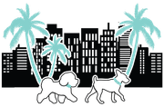 Two dogs are walking in front of a city skyline with palm trees.