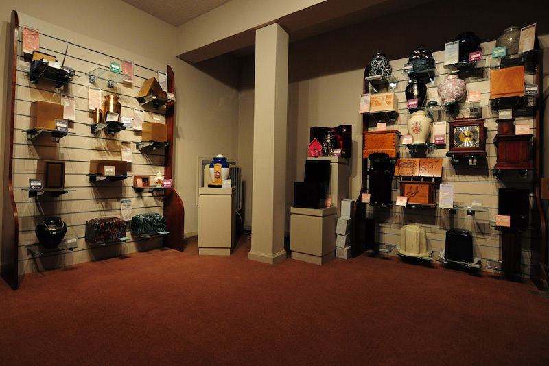 A room with display shelves holding various items, likely for sale.