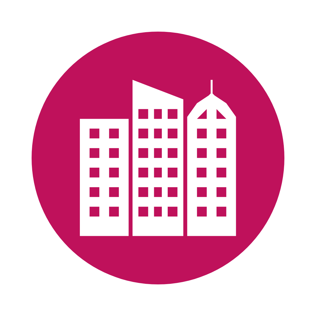 White buildings icon on a magenta circle.