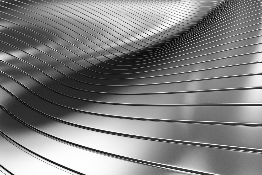 A Close up Of a Metal Surface with A Swirling Pattern — FBM Fabrication In Wollongong, NSW