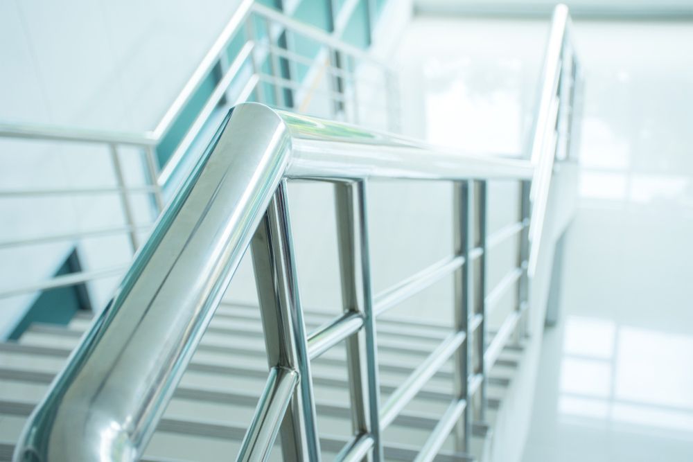 A Close up Of a Metal Railing on A Set of Stairs — FBM Fabrication In Wollongong, NSW