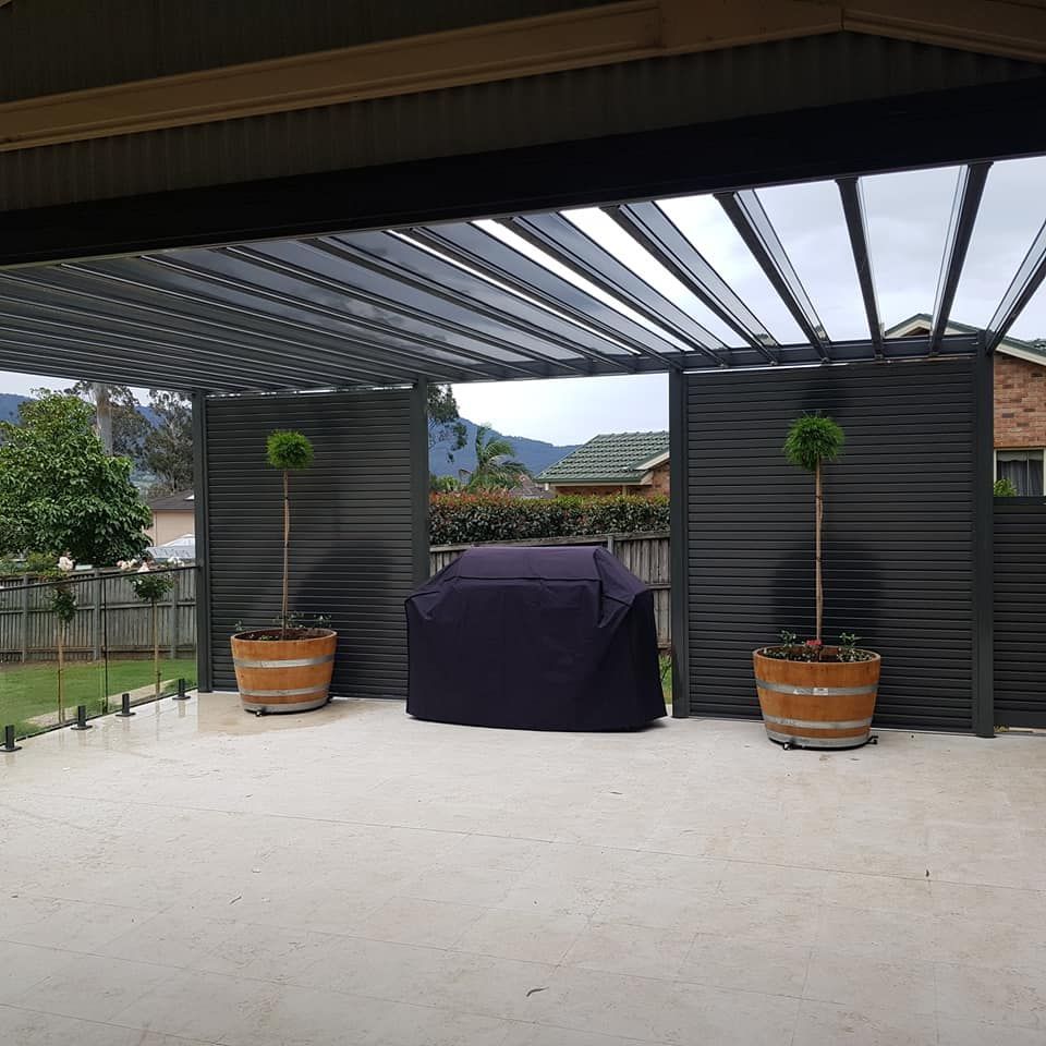 A Concrete Wall Is Being Built on The Side of A Hill — FBM Fabrication In Dapto, NSW