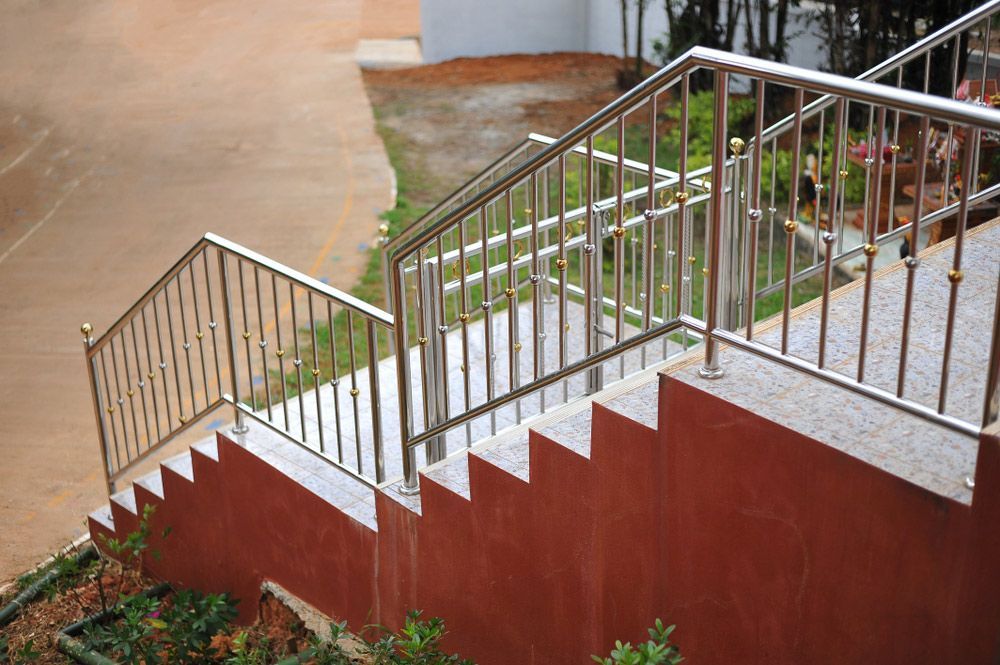 A Set of Stairs with A Stainless Steel Railing — FBM Fabrication In Dapto, NSW