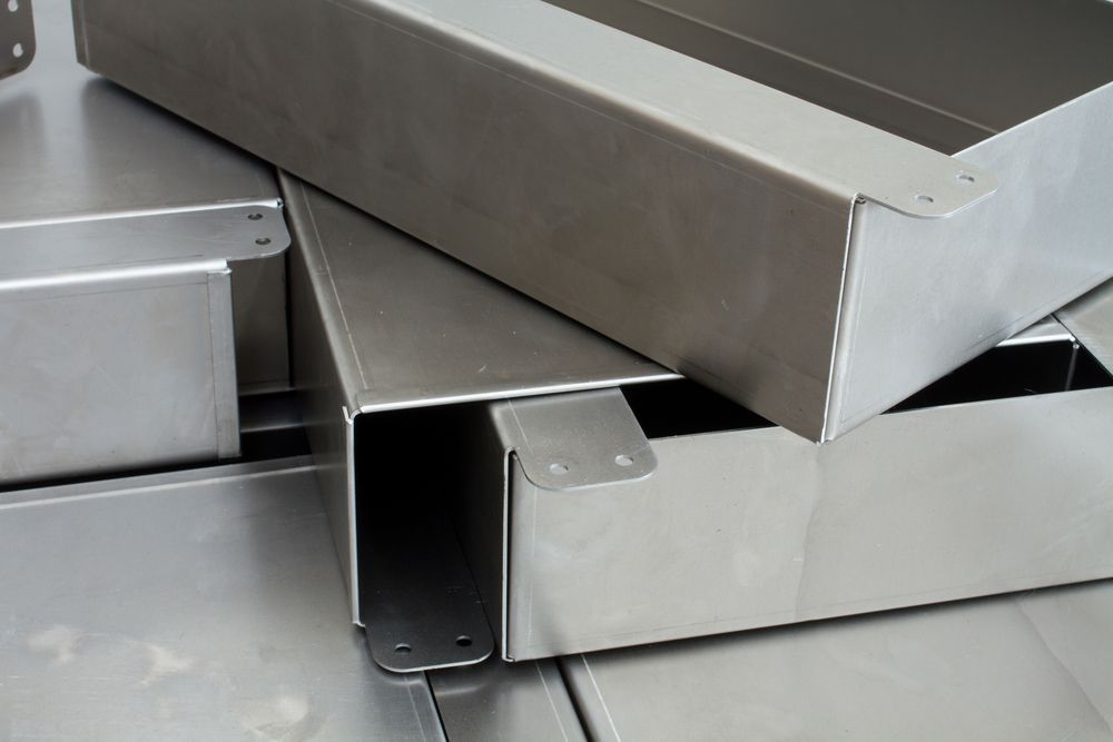 A Stack of Stainless Steel Boxes Are Stacked on Top of Each Other — FBM Fabrication In Shellharbour, NSW