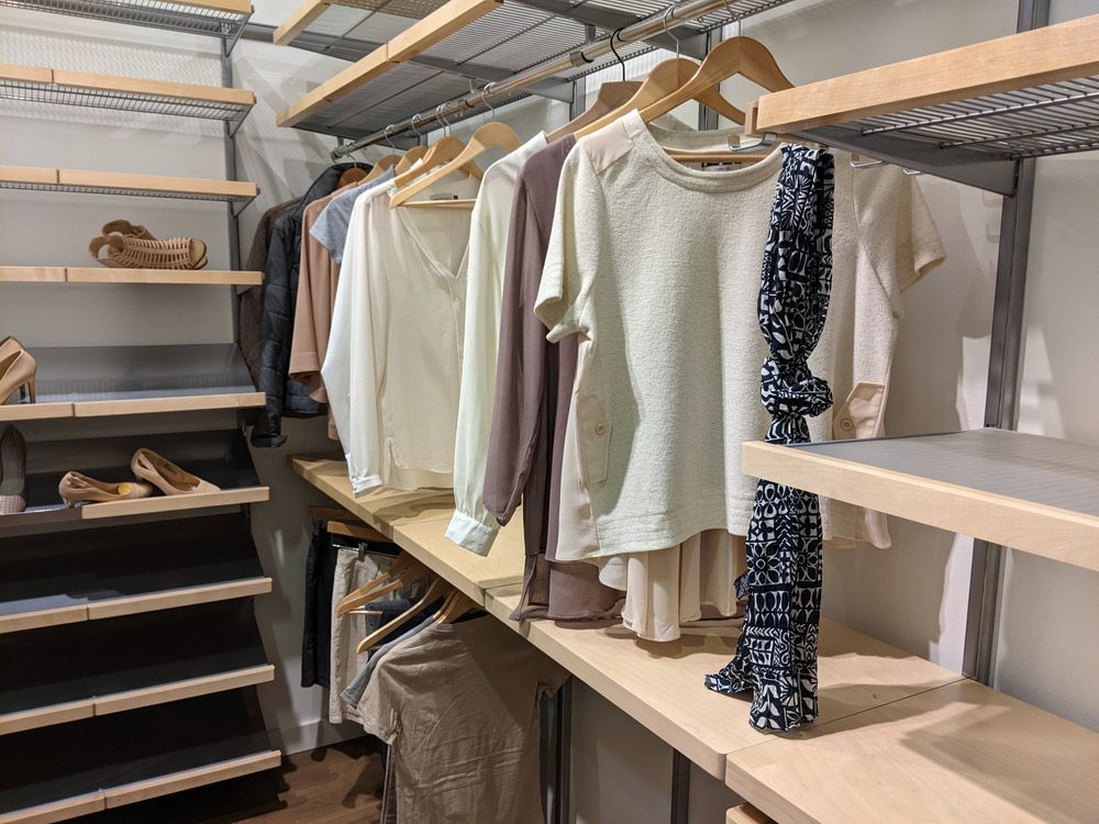 A Walk in Closet Filled with Clothes and Shoes — FBM Fabrication In Dapto, NSW