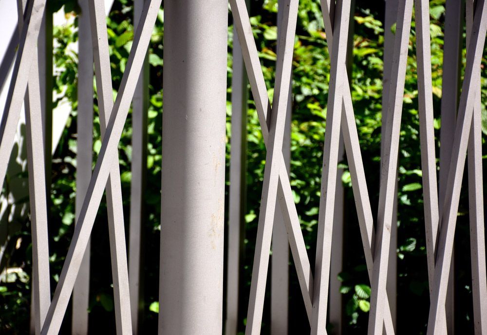 A Close up Of a Fence with Trees in The Background — FBM Fabrication In Dapto, NSW