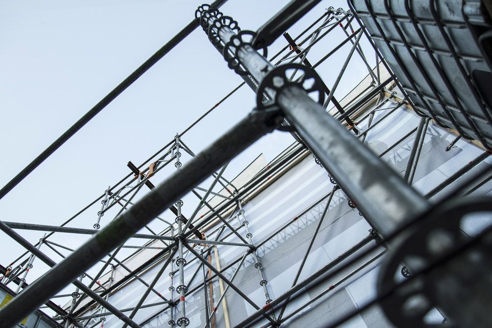 Looking up At a Scaffolding Structure with A Building in The Background — FBM Fabrication In Shellharbour, NSW