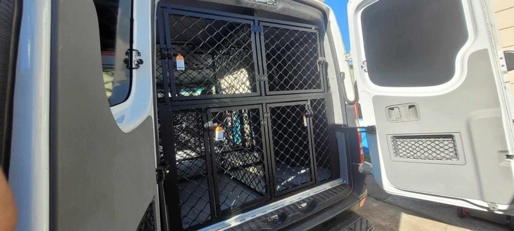 A Dog Is Sitting on The Back of A Truck — FBM Fabrication In Dapto, NSW