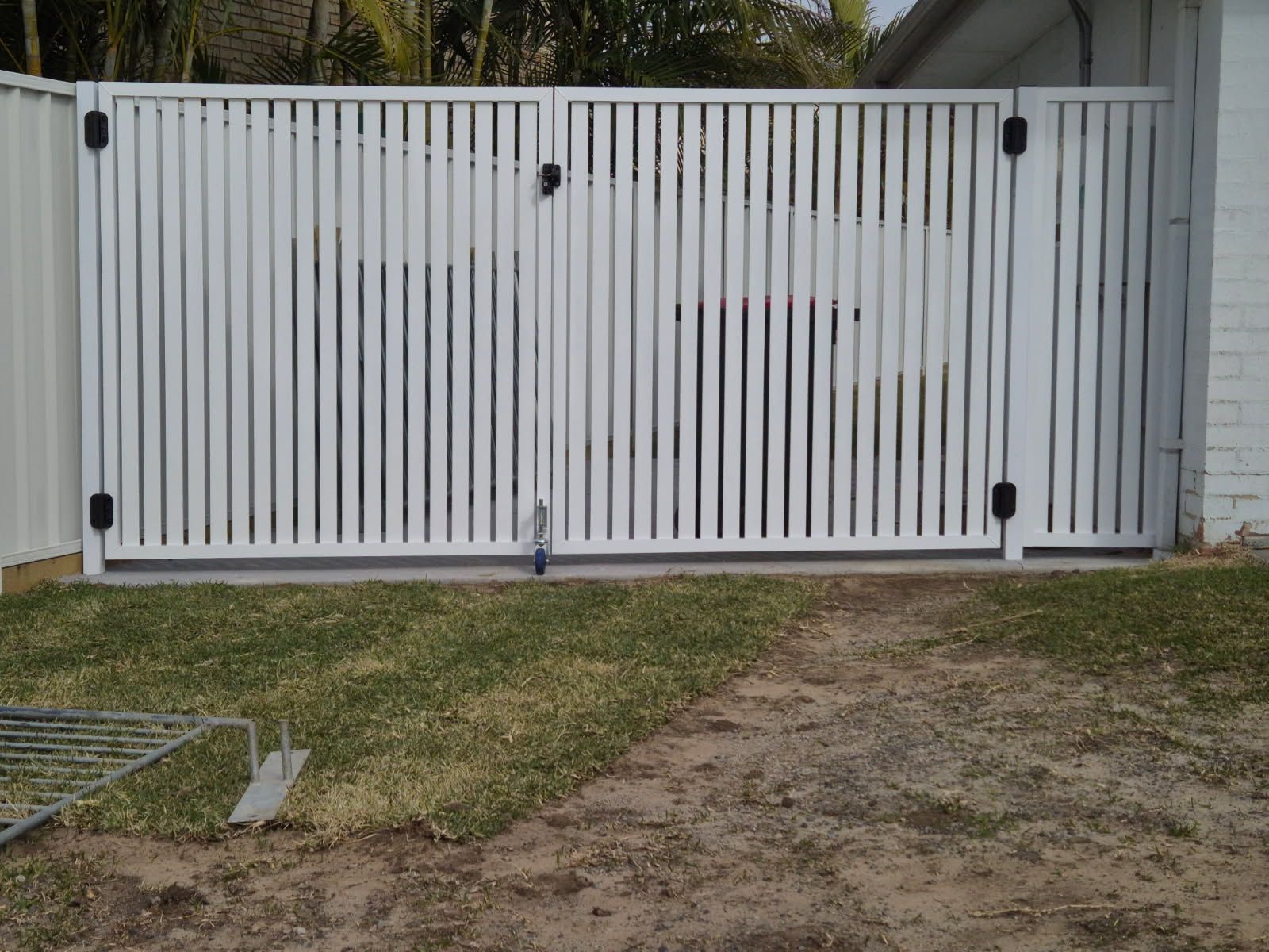 White Double Driveway Gate With Vertical Slats — FBM Fabrication In Dapto, NSW