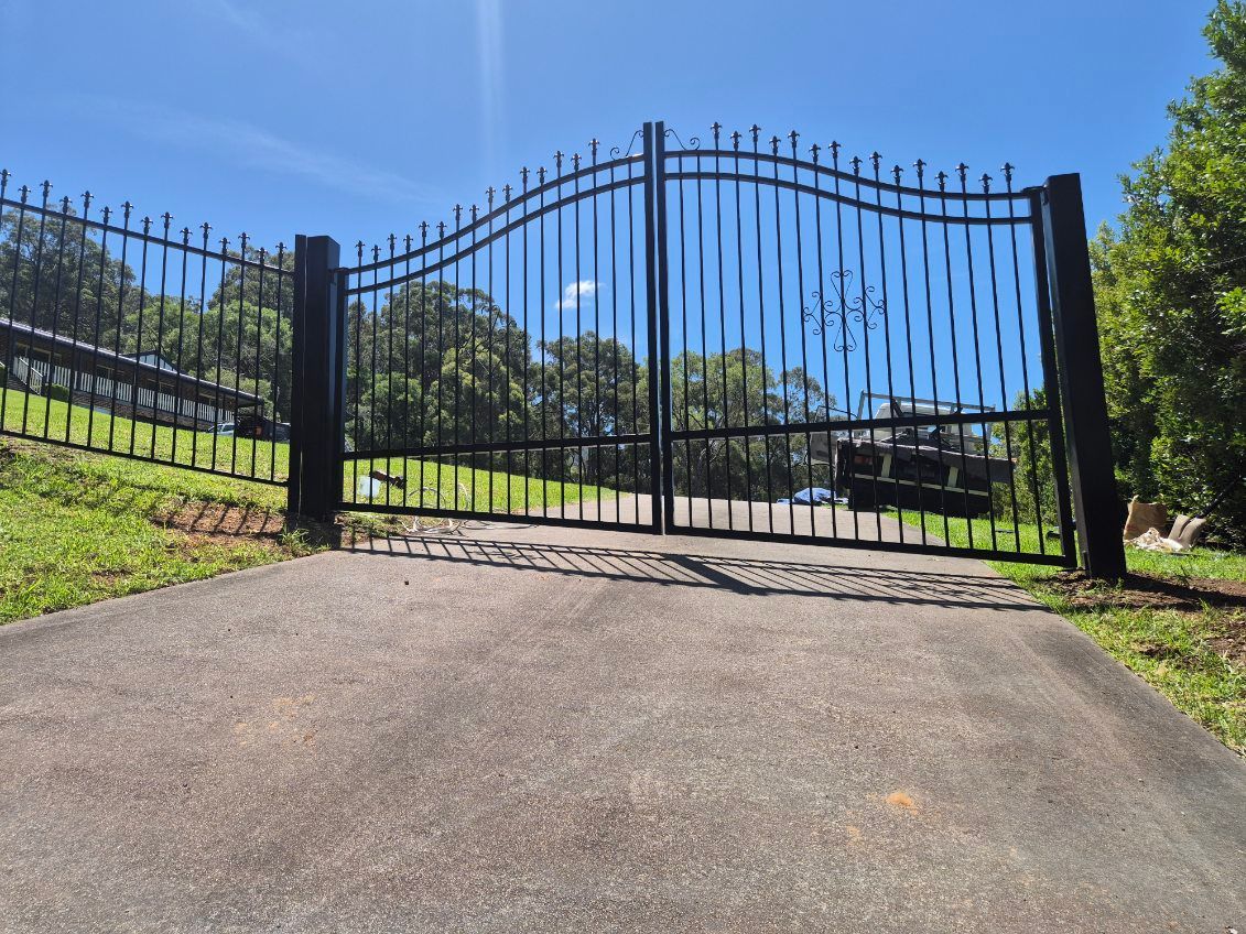 Black Metal Gate Across a Driveway — FBM Fabrication In Dapto, NSW