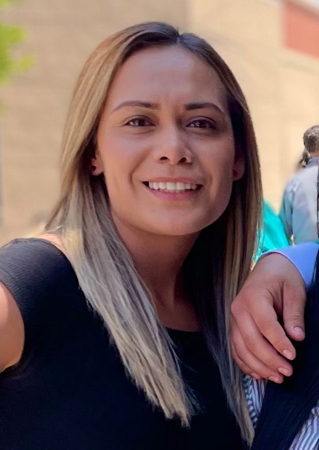 Smiling woman with straight hair