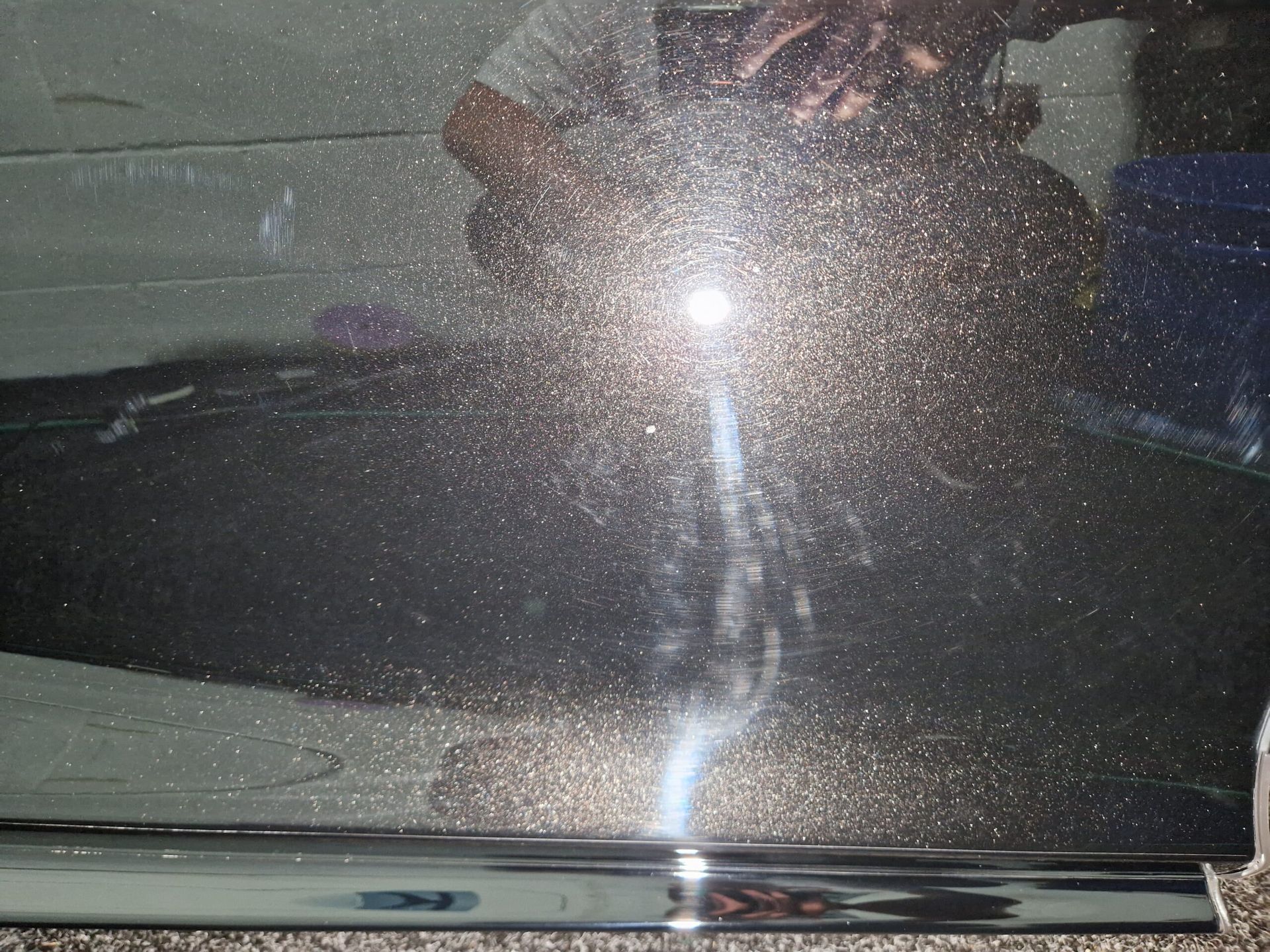 A person is taking a picture of themselves in a mirror