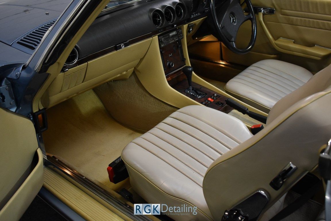 The interior of a car with the word rgk decaling on the bottom
