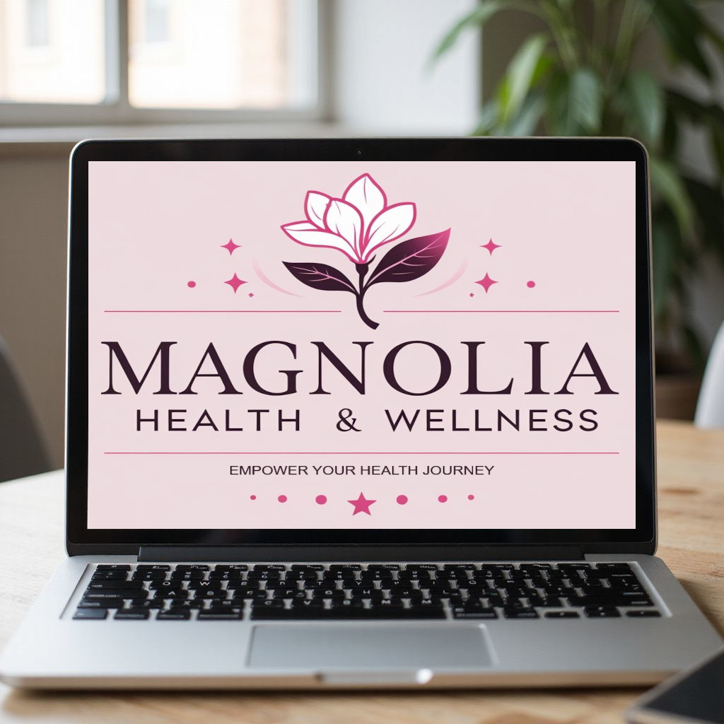 Laptop displaying the Magnolia Health & Wellness logo: floral design in pink and dark purple.