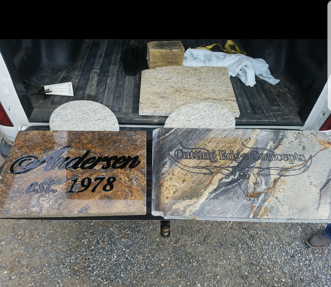A couple of plaques that say anderson 1978 are in the back of a truck
