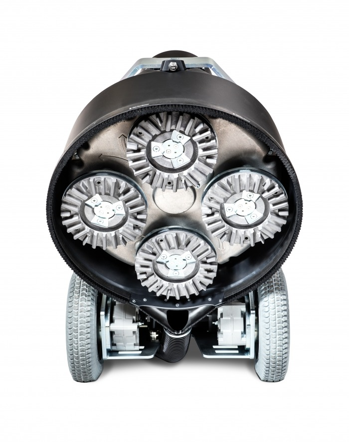 A close up of a machine with four wheels on a white background.
