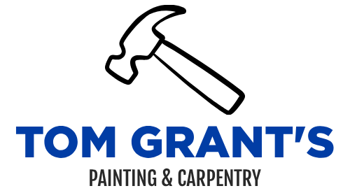 Logo for Tom Grant's Painting & Carpentry featuring a black outline of a hammer above blue and black text.