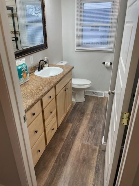 An aerial view of a large wave in the ocean.