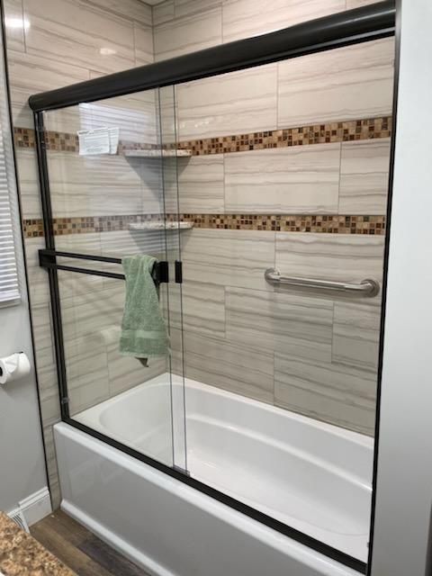 An aerial view of a large wave in the ocean.