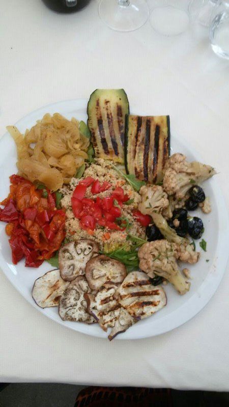 Melanzane grigliate con peperoni cereali e pomodorini Enna