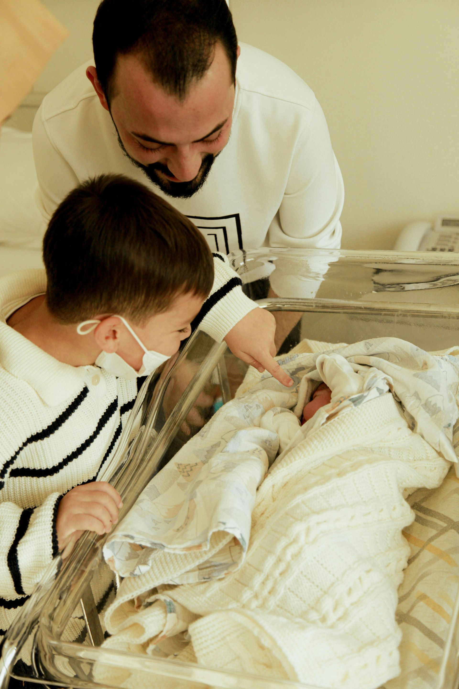 Sandy desert dune under a pale blue sky.