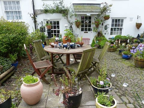 Landscaping Attractive patio garden with plant pots hitchin