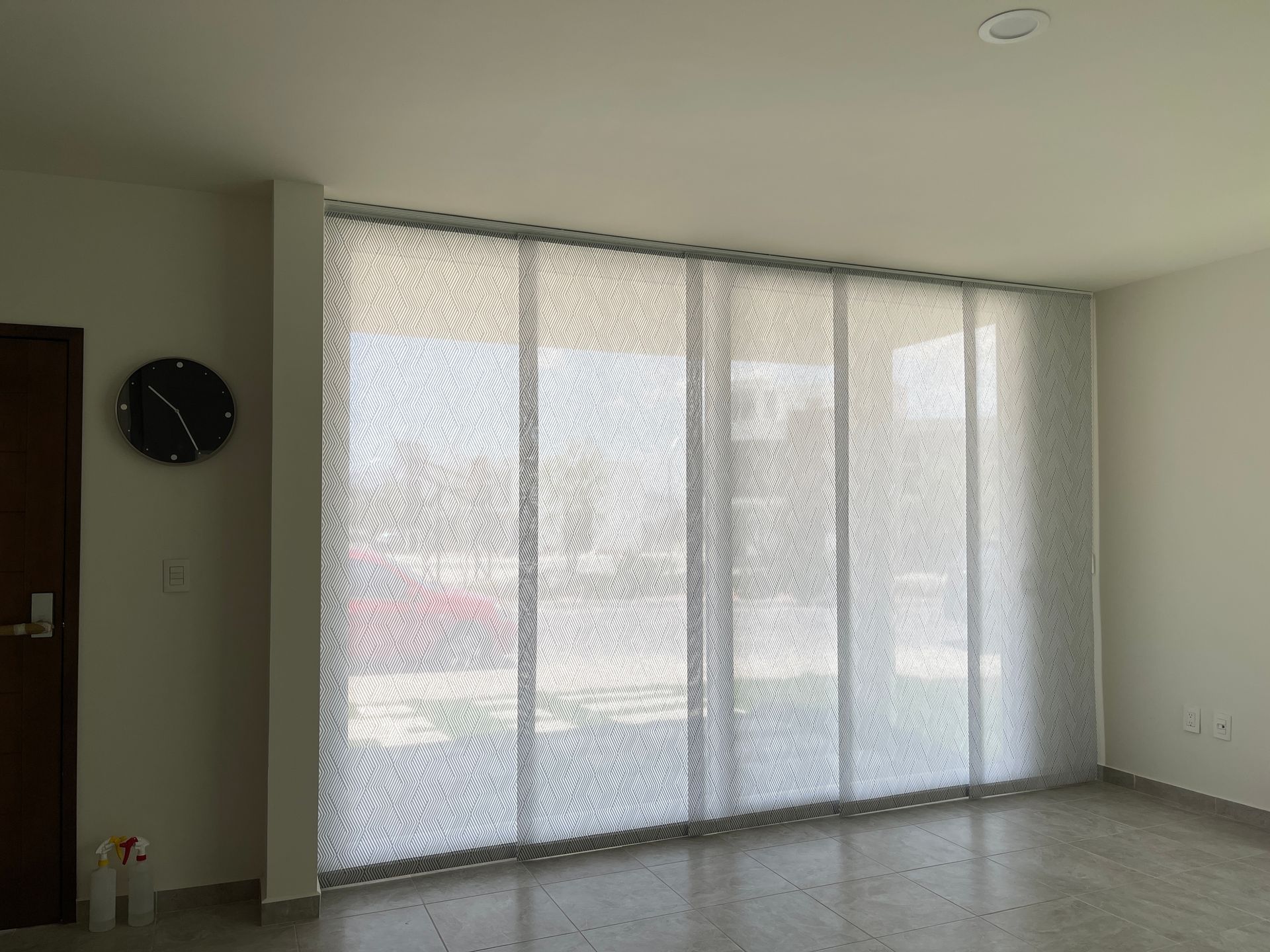 Panel Track Blinds Covering a Large Window — Huntlee Blinds and Shutters in Badagarang, NSW